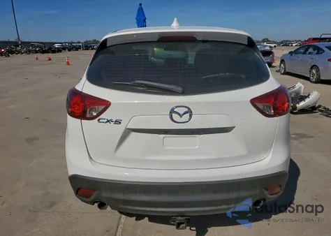 2014 Mazda Cx-5 Sport z USA, uszkodzony, nr VIN JM3KE2BE0E0409662